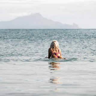 Surfer girl on surfboard photography art print